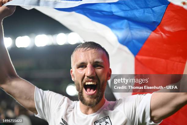 Tomas Soucek of West Ham United celebrates with a Czech Republic flag after the team's victory during the UEFA Europa Conference League 2022/23 final...