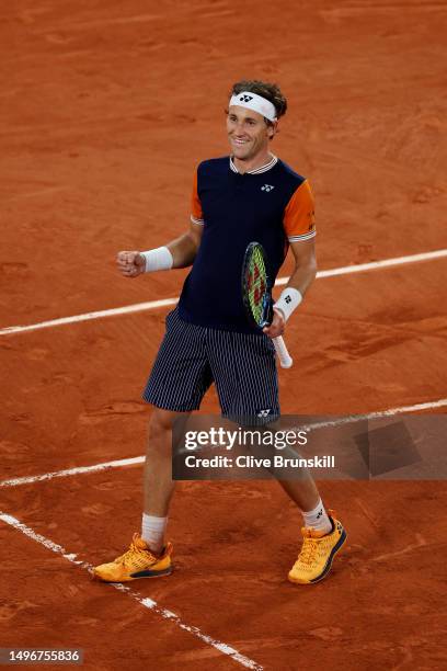 Casper Ruud of Norway celebrates winning match point against Holger Rune of Denmark during the Men's Singles Quarter Final match on Day Eleven of the...