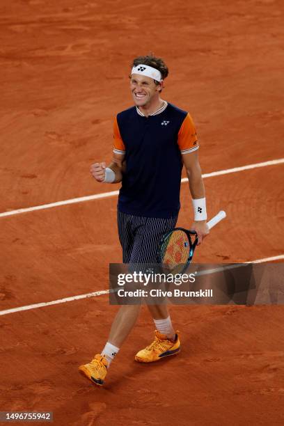 Casper Ruud of Norway celebrates winning match point against Holger Rune of Denmark during the Men's Singles Quarter Final match on Day Eleven of the...