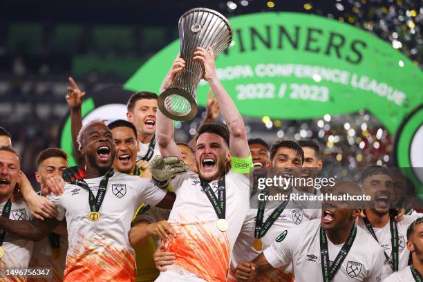 Declan Rice of West Ham United lifts the UEFA Europa Conference League trophy after the team's victory during the UEFA Europa Conference League...