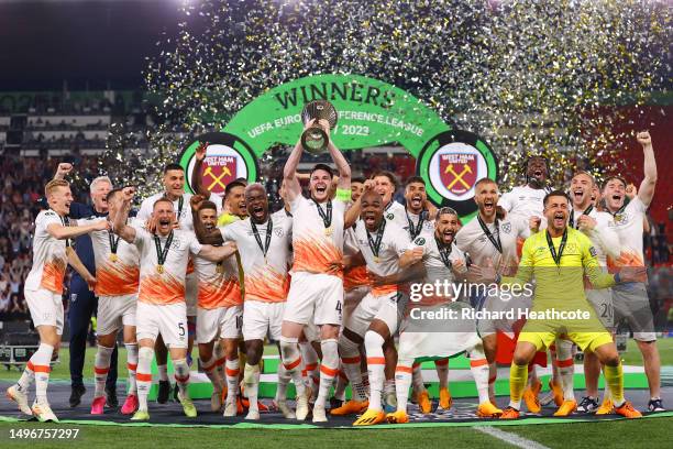 Declan Rice of West Ham United lifts the UEFA Europa Conference League trophy after the team's victory during the UEFA Europa Conference League...