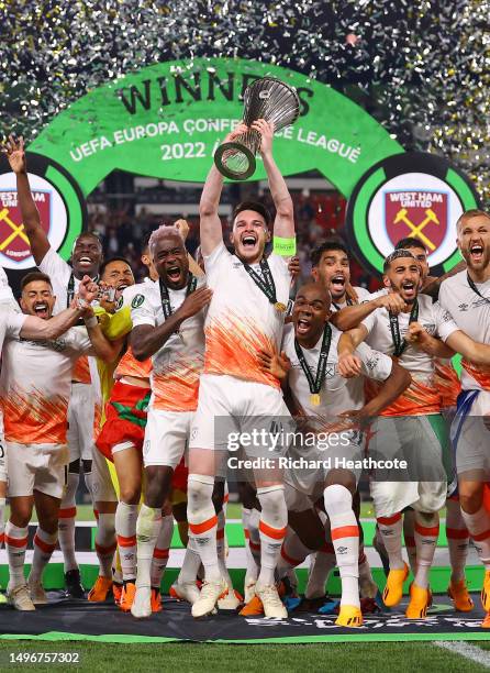 Declan Rice of West Ham United lifts the UEFA Europa Conference League trophy after the team's victory during the UEFA Europa Conference League...