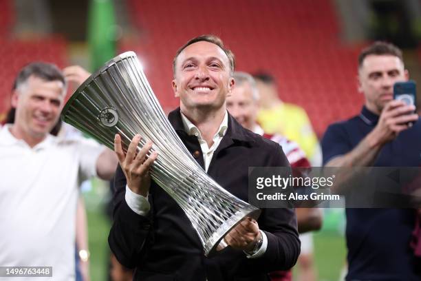 Mark Noble, former West Ham United player celebrates with the UEFA Europa Conference League trophy after the team's victory during the UEFA Europa...