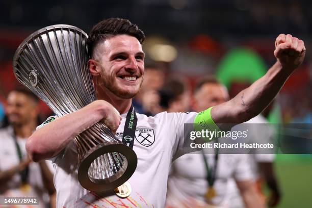 Declan Rice, Captain of West Ham United celebrates with the UEFA Europa Conference League trophy after the team's victory during the UEFA Europa...