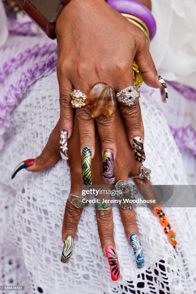 Close up of decorated long fingernails