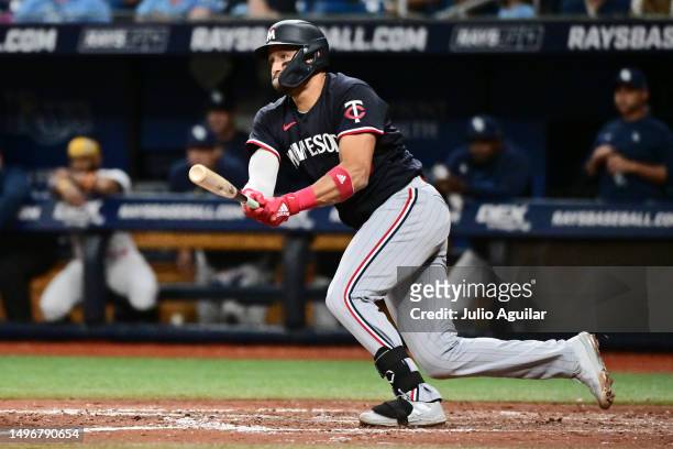 Royce Lewis of the Minnesota Twins hits an RBI single in the ninth inning against the Tampa Bay Rays at Tropicana Field on June 07, 2023 in St...