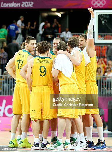 Australia celebrates their 81-61 victory over China following their Men's Basketball Preliminary Round match on Day 6 of the London 2012 Olympic...