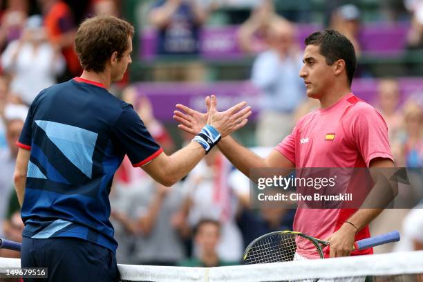 Andy Murray of Great Britain shakes hands with Nicolas Almagro of Spain after defeating him in the Quarterfinal of Men's Singles Tennis on Day 6 of...