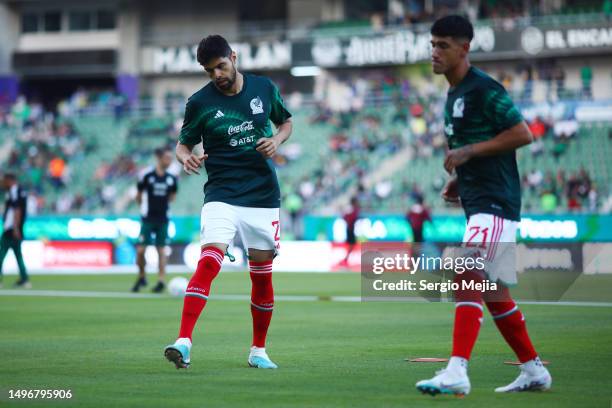 Nestor Araujo and Uriel Antuna of Mexico warm up prior to an international friendly match between Mexico and Guatemala at Kraken Stadium on June 07,...