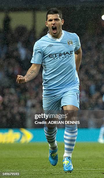 Manchester City's Argentinian striker Sergio Aguero celebrates after scoring the opening goal of the English Premier League football match between...