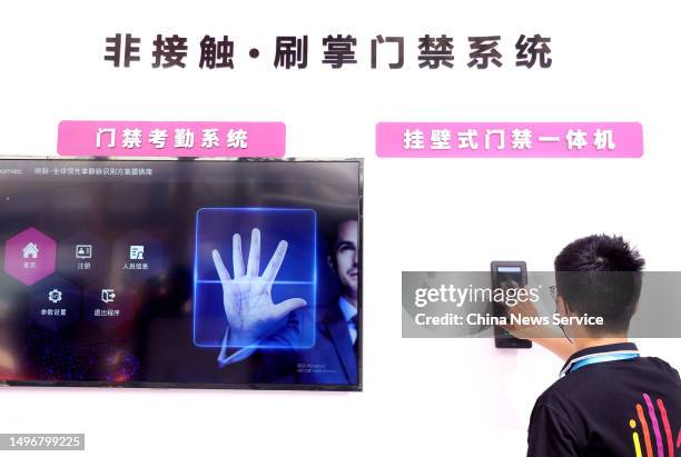 Exhibitor demonstrates Palm Recognition Access Control System during 2023 China International Exhibition on Public Safety and Security on June 7,...