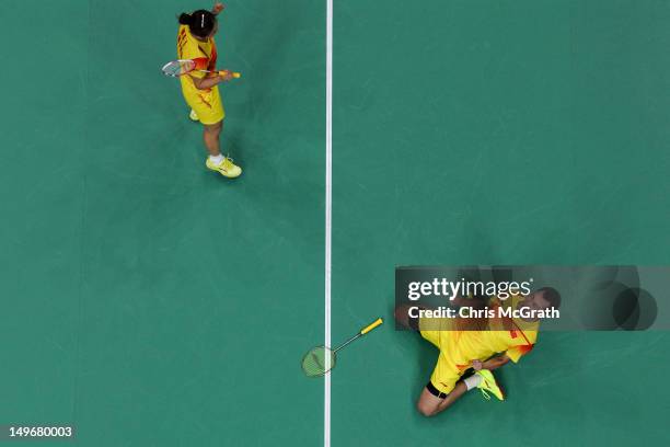 Jin Ma and Chen Xu of China celebrate victory over Tontowi Ahmad and Lilyana Natsir of of Indonesia in their Mixed Doubles Badminton semi final on...