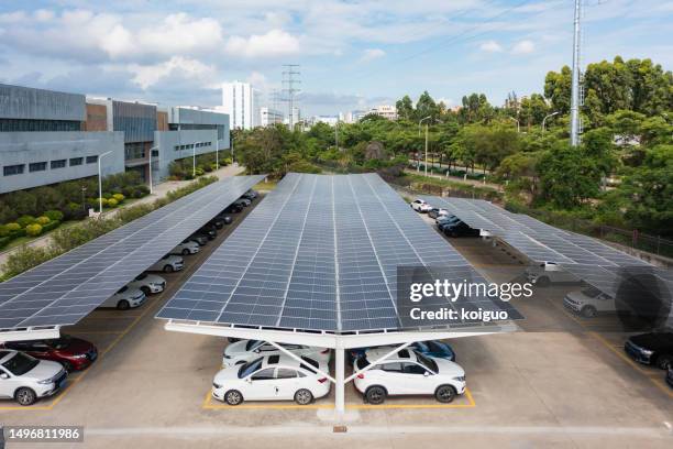 parking lot solar sunshade and electric vehicle charging station - car sunshade stock pictures, royalty-free photos & images