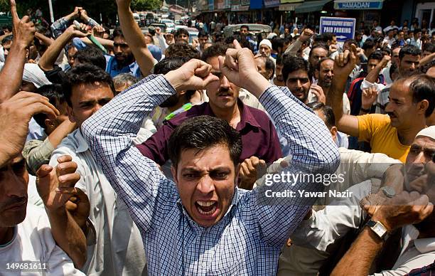 Supporters of the Communist Party of India CPI stage a protest against a price hike in essential commodities on August 2, 2012 in Srinagar, the...