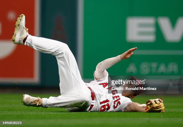 Mickey Moniak of the Los Angeles Angels makes the out against Nico Hoerner of the Chicago Cubs in the eighth inning at Angel Stadium of Anaheim on...