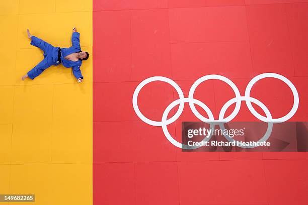 Tuvshinbayar Naidan of Mongolia celebrates defeating Hee-Tae Hwang of Korea in the Men's -100 kg Judo on Day 6 of the London 2012 Olympic Games at...