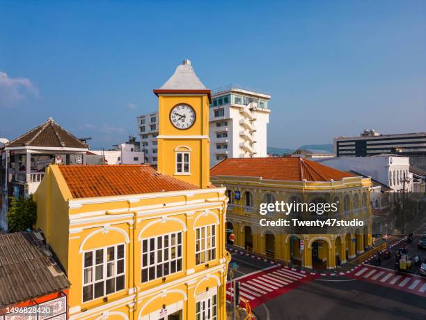 aerial view of phuket town square clock tower - phuket old town stock-fotos und bilder