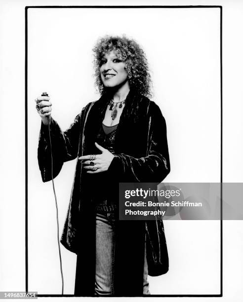 American singer, actress and comedian Bette Midler poses for a portrait in Los Angeles, California, circa 1979. She starred in the American musical...