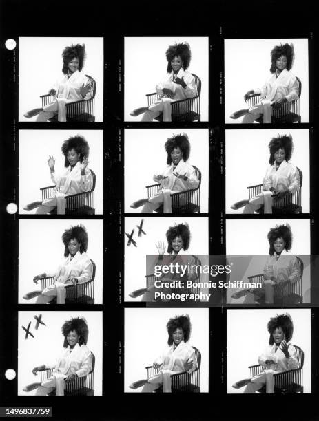 American singer Patti LaBelle poses for a portrait sitting in a chair in these twelve images on one proof sheet in Los Angeles, California, circa...