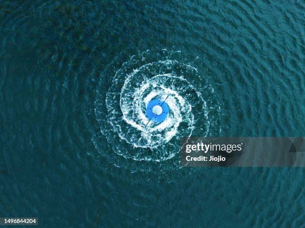 water vortex - water surface line stock pictures, royalty-free photos & images