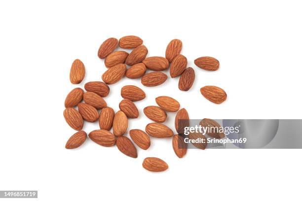 almond nuts on a white background - almonds foto e immagini stock