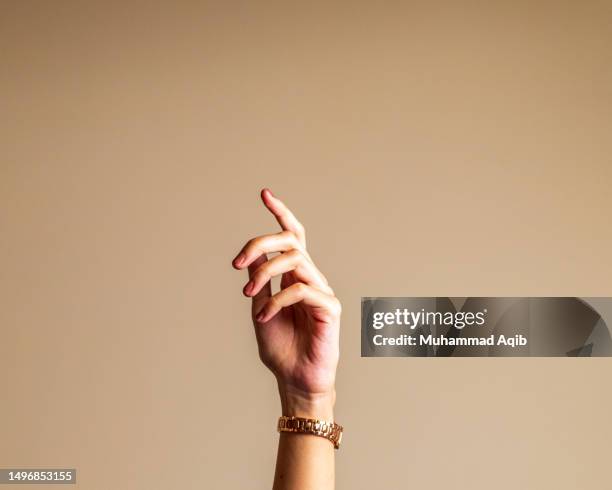 young woman's hand gestures. - woman index finger stock pictures, royalty-free photos & images