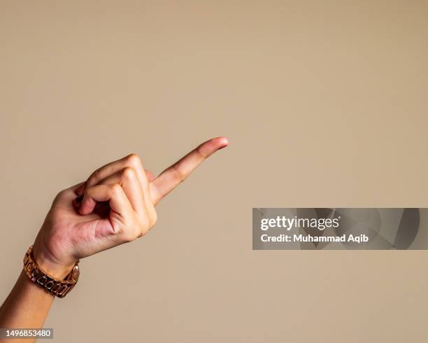 young woman's hand gestures. - woman index finger stock pictures, royalty-free photos & images