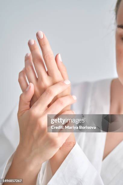 well-groomed female hands with manicure. - glatte oberfläche stock-fotos und bilder