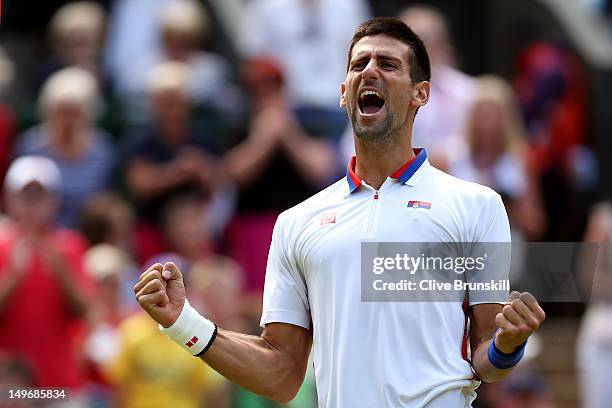 Novak Djokovic of Serbia celebrates after defeating Jo-Wilfried Tsonga of France in the Quarterfinal of Men's Singles Tennis on Day 6 of the London...