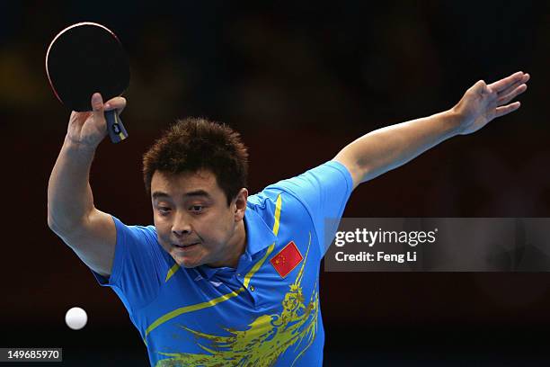 Wang Hao of China plays a shot during Men's Singles Table Tennis Gold medal match against Zhang Jike of China on Day 6 of the London 2012 Olympic...