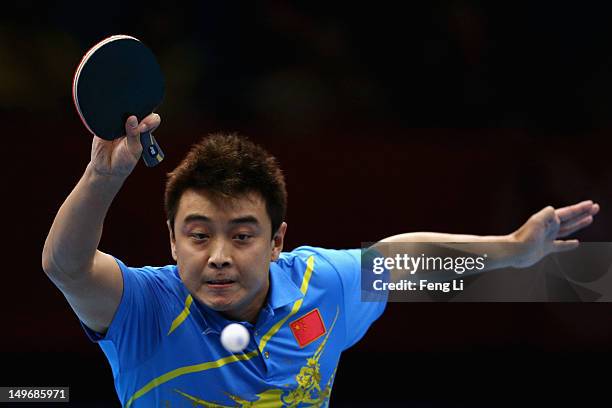 Wang Hao of China plays a shot during Men's Singles Table Tennis Gold medal match against Zhang Jike of China on Day 6 of the London 2012 Olympic...