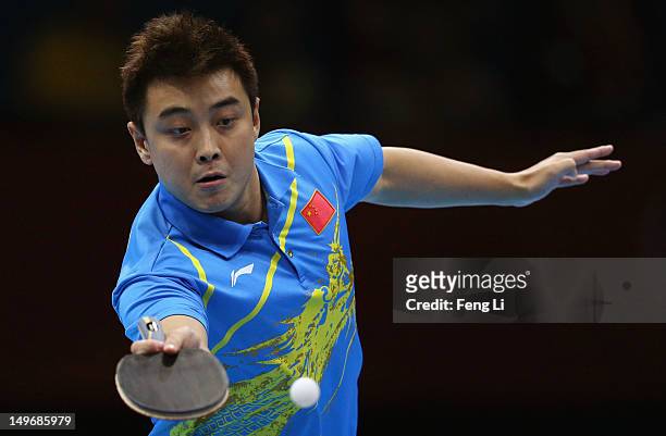 Wang Hao of China plays a shot during Men's Singles Table Tennis Gold medal match against Zhang Jike of China on Day 6 of the London 2012 Olympic...