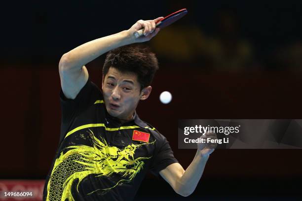 Zhang Jike of China plays a shot during Men's Singles Table Tennis Gold medal match against Wang Hao of China on Day 6 of the London 2012 Olympic...