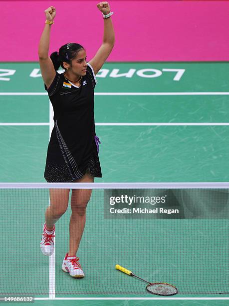 Saina Nehwal of India celebrates winning against Tine Baun of Denmark in their Womens Singles Badminton quarter final on day 6 of the London 2012...