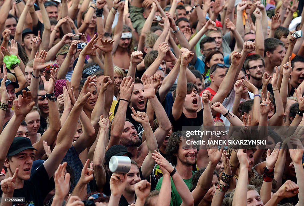 The crowd cheers during the opening of t