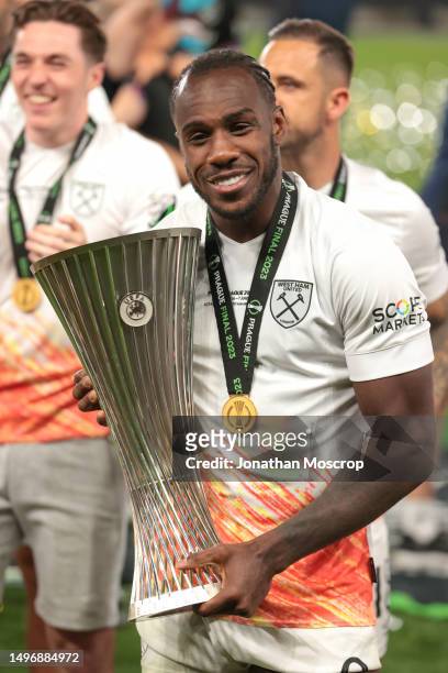 Michail Antonio of West Ham United celebrates with the trophy following the 2-1 victory in the UEFA Europa Conference League 2022/23 final match...