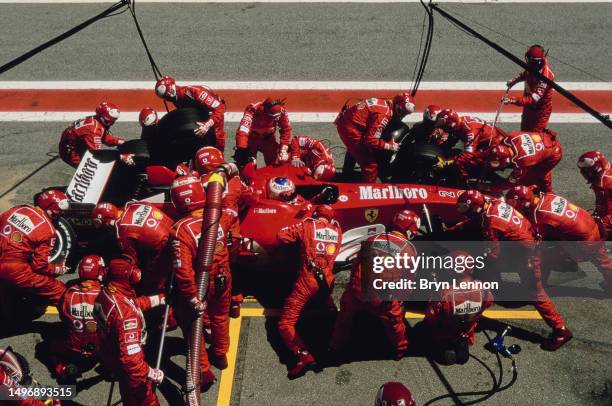 Rubens Barrichello from Brazil, driver of the Scuderia Ferrari Marlboro Ferrari F2003-GA Ferrari V10 makes a refuelling and tyre change pit stop...