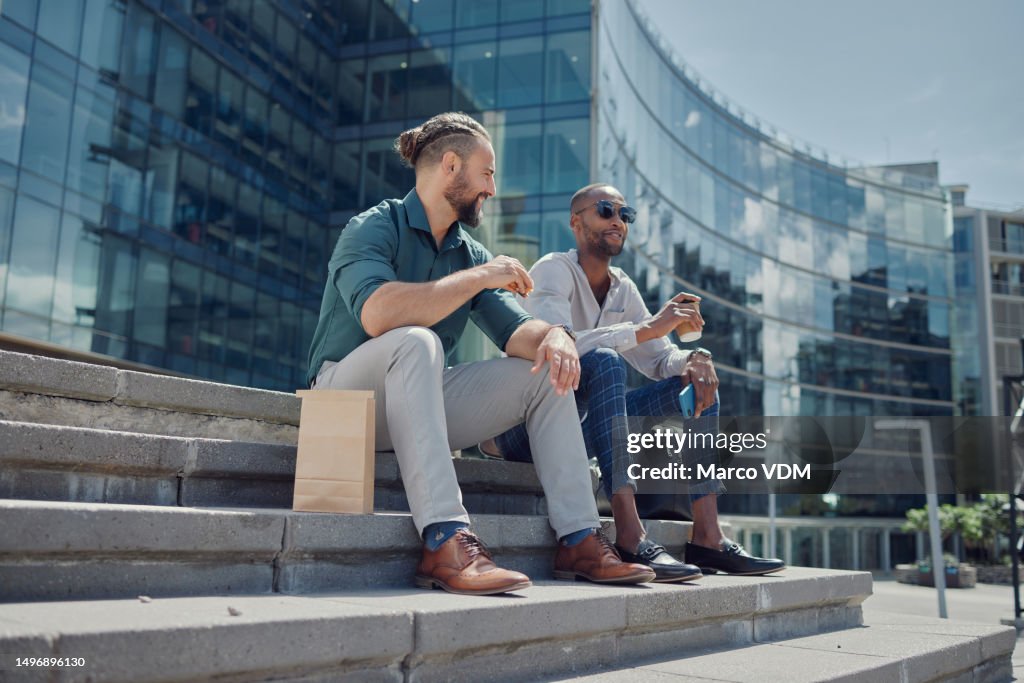 City, steps and men sitting on lunch break to relax with coffee, sun and smile with work friendship. Talking, relaxing at meal time and startup employees on stairs outside office building together.
