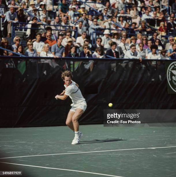 American tennis player John McEnroe plays a backhand during the Semi Final of the the US Open Men's Singles tournament, Flushing Meadows, New York,...