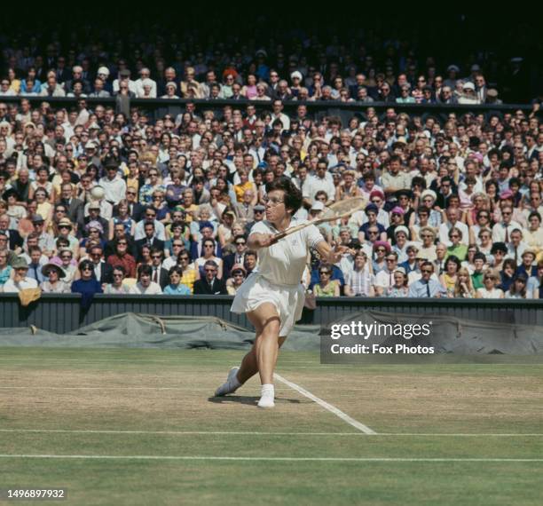 American tennis player Billie Jean King plays a backhand volley during the Final of the Women's Singles tournament at Wimbledon, All England Lawn...