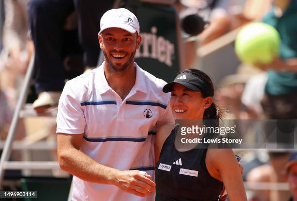 Tim Puetz of Germany and partner Miyu Kato of Japan celebrate winning match point against Bianca Andreescu of Canada and Michael Venus of New Zealand...