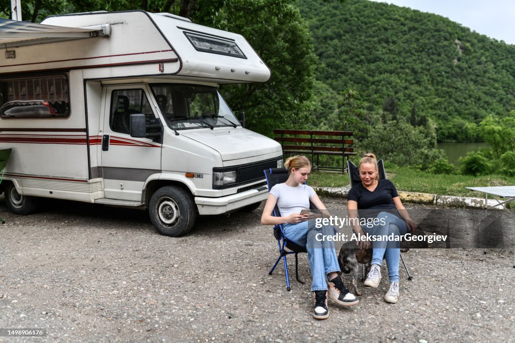 Mom Driving Rv Mother And Daughter On Camping Trip With Rv And Dog High-Res Stock ...