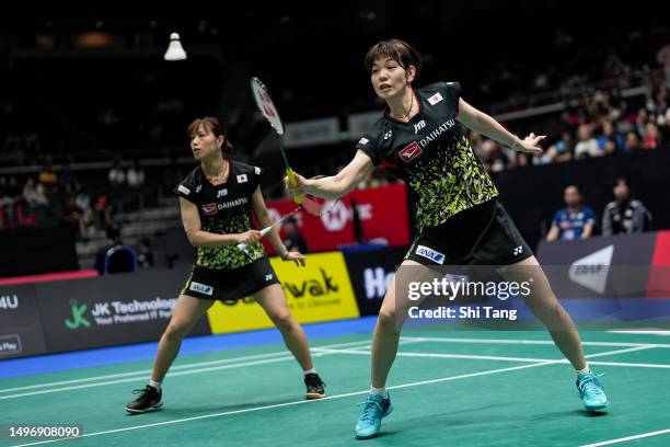 Yuki Fukushima and Sayaka Hirota of Japan compete in the Women's Doubles Second Round match against Li Wenmei and Liu Xuanxuan of China on day three...