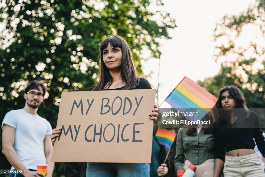 People are marching together during LGBTQIA event