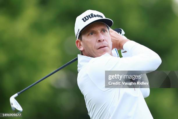 Ricky Barnes of the United States hits his first shot on the 10th hole during the first round of the RBC Canadian Open at Oakdale Golf & Country Club...