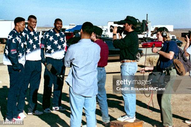 Olympic Dream Team III mens basketball and NBA members Scottie Pippen of the Chicago Bulls, David Robinson of the San Antonio Spurs and Hakeem...