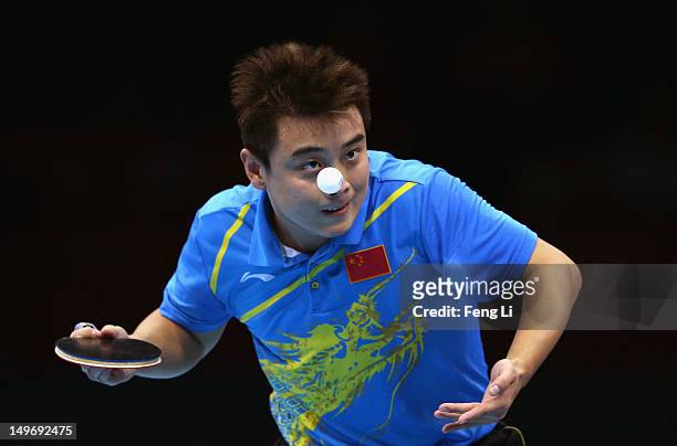 Wang Hao of China serves on during Men's Singles Table Tennis Gold medal match against Zhang Jike of China on Day 6 of the London 2012 Olympic Games...