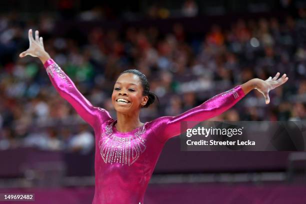 Gabrielle Douglas of the United States reacts after he competes on the balance beam in the Artistic Gymnastics Women's Individual All-Around final on...