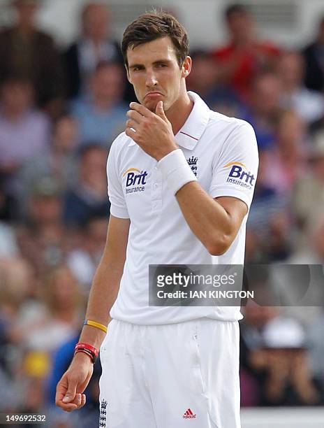 England's Steven Finn gestures after bowling during the first day of the second international Test cricket match between England and South Africa at...