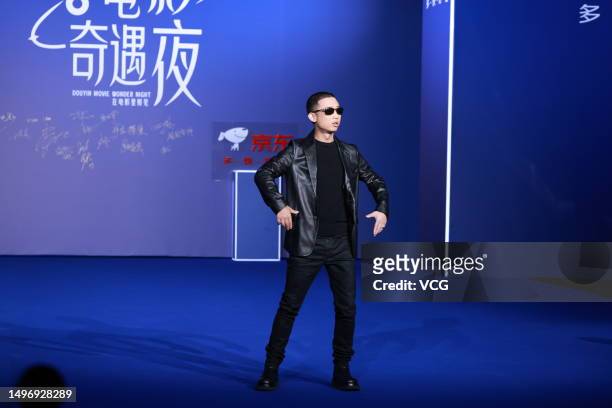 Rapper GAI Zhou Yan arrives at the red carpet for Douyin Movie Wonder Night on June 8, 2023 in Shanghai, China.